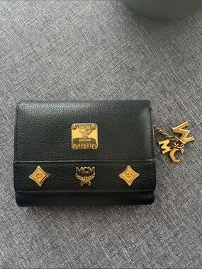 MCM Black Pebbled Leather Wallet with Gold Logo Hardware